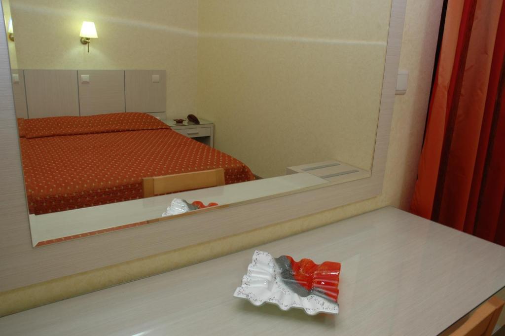 Postel nebo postele na pokoji v ubytování Hotel Pantheon