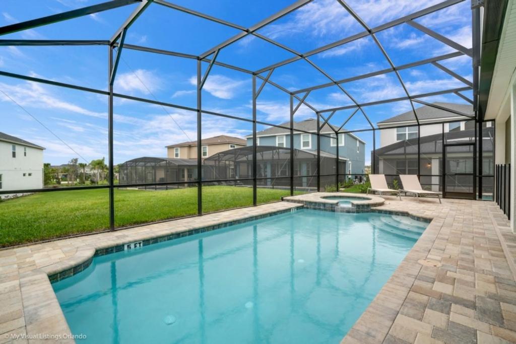 The swimming pool at or close to 1719Cvt Orlando Newest Resort Community Home Villa