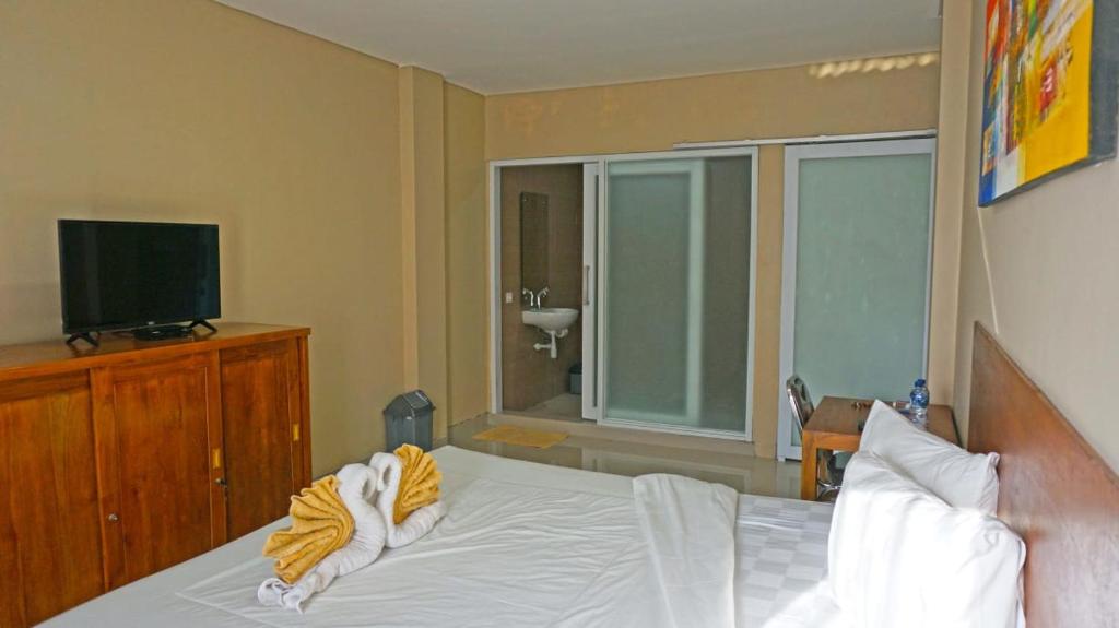 Postel nebo postele na pokoji v ubytování Brielle guest house