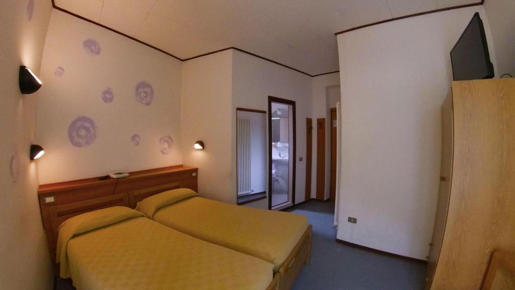 TV a/nebo společenská místnost v ubytování Hotel Alberello