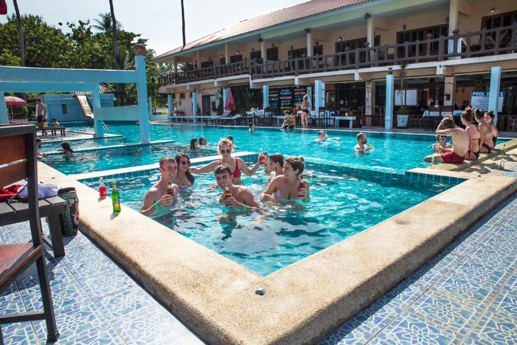 a group of people in a swimming pool at Paradise Bungalows in Haad Rin