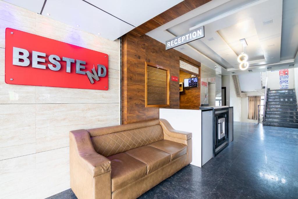 a store with a couch in the middle of a room at Hotel Bestend in Bangalore