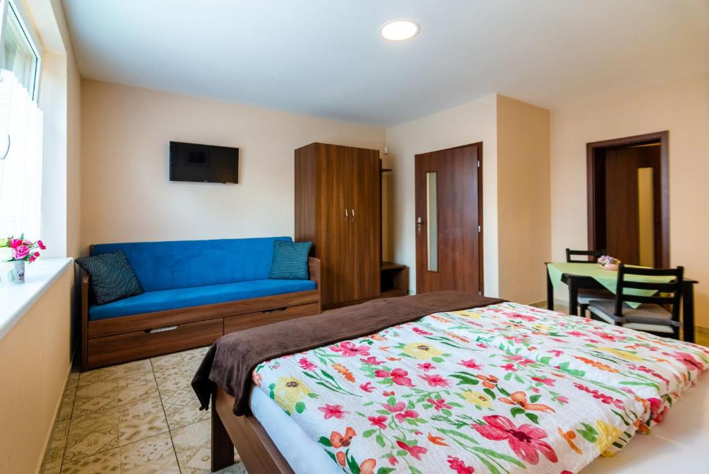 Postel nebo postele na pokoji v ubytování Villa Ephélia