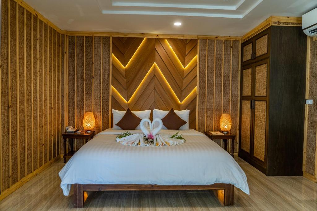 Кровать или кровати в номере Adarin Beach Resort