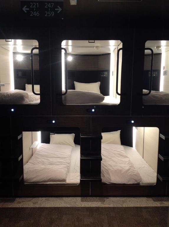 Postel nebo postele na pokoji v ubytování Matsue Urban Hotel CubicRoom