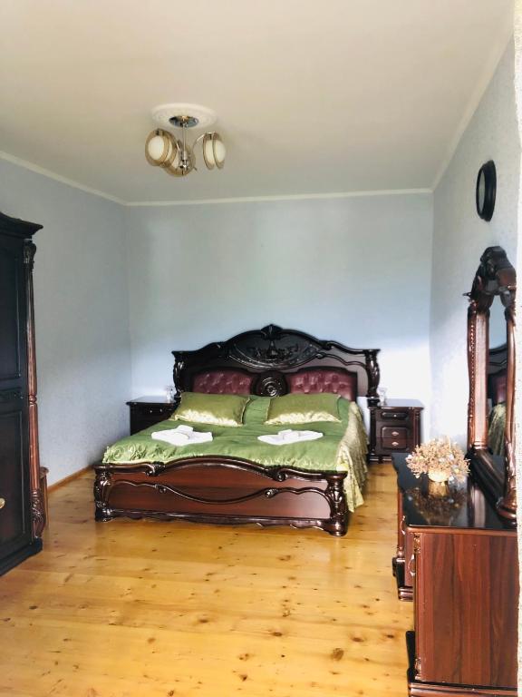 Postel nebo postele na pokoji v ubytování Guest House Vivaushba