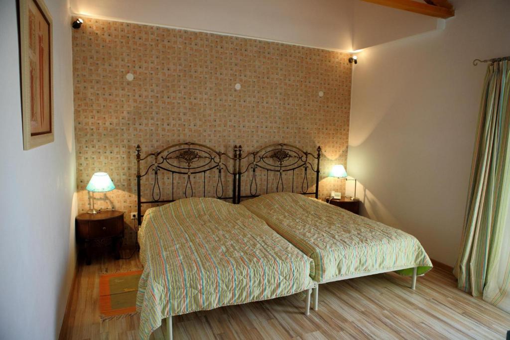 Postel nebo postele na pokoji v ubytování Malemi Organic Hotel