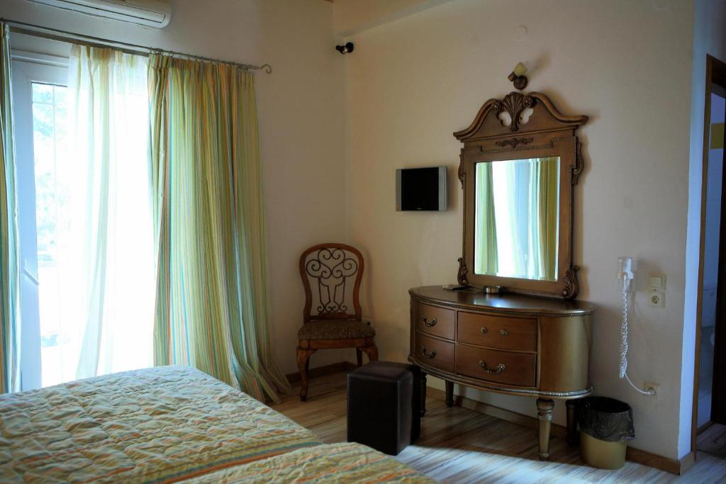 Postel nebo postele na pokoji v ubytování Malemi Organic Hotel