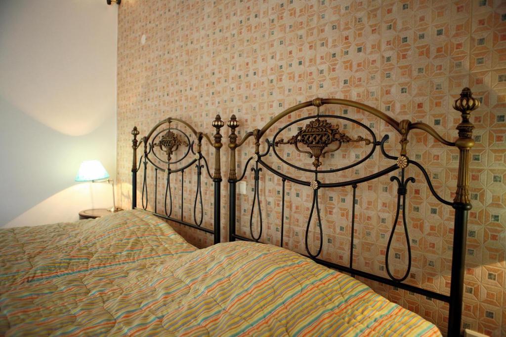 Postel nebo postele na pokoji v ubytování Malemi Organic Hotel