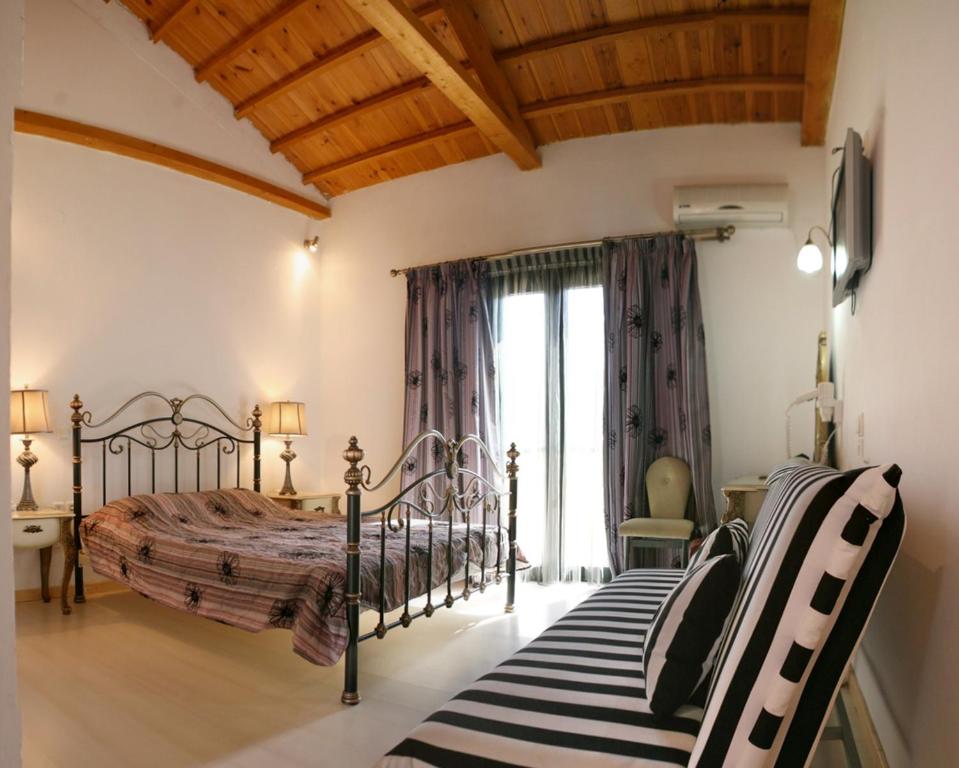 Postel nebo postele na pokoji v ubytování Malemi Organic Hotel