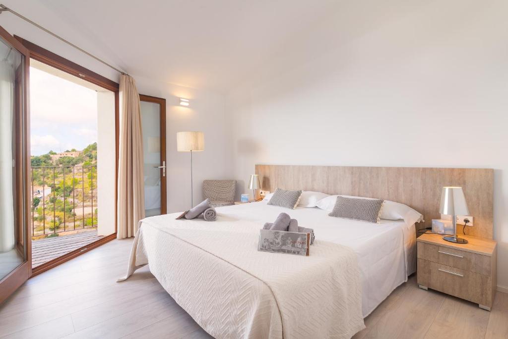 A bed or beds in a room at Can jordi