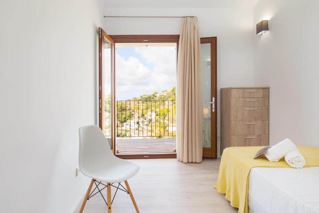 A bed or beds in a room at Can jordi