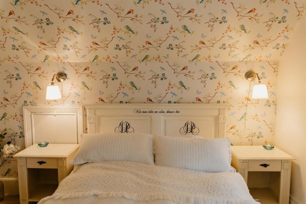 Postel nebo postele na pokoji v ubytování Jungshoved Præstegård B&B