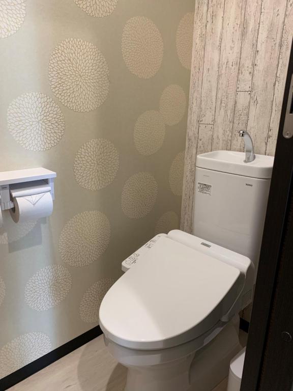 Koupelna v ubytování Hotel Capsule Inn Shizuoka