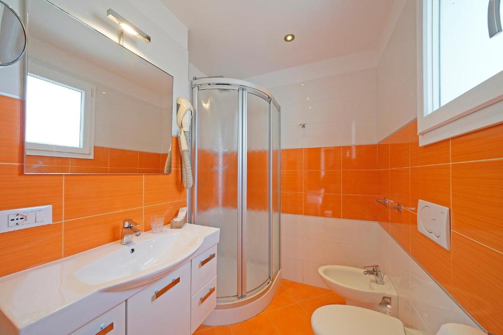 Koupelna v ubytování Hotel Strand a frontemare