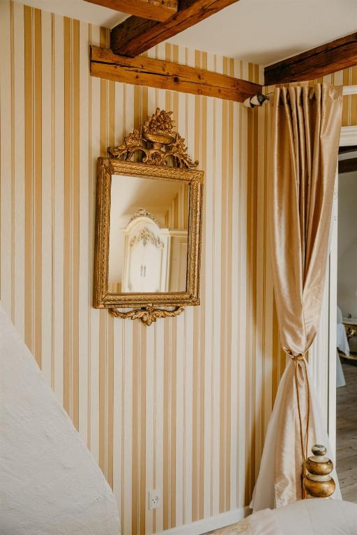 Postel nebo postele na pokoji v ubytování Jungshoved Præstegård B&B