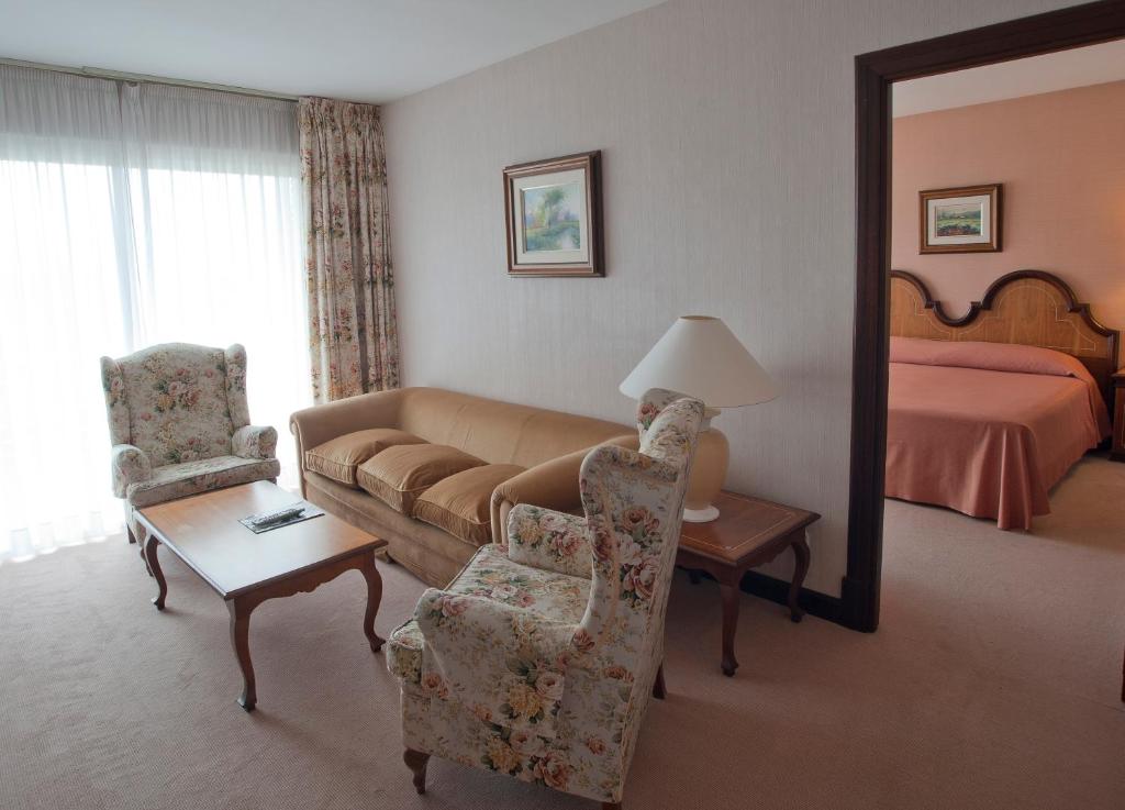 Postel nebo postele na pokoji v ubytování Hotel Riu Fluviá