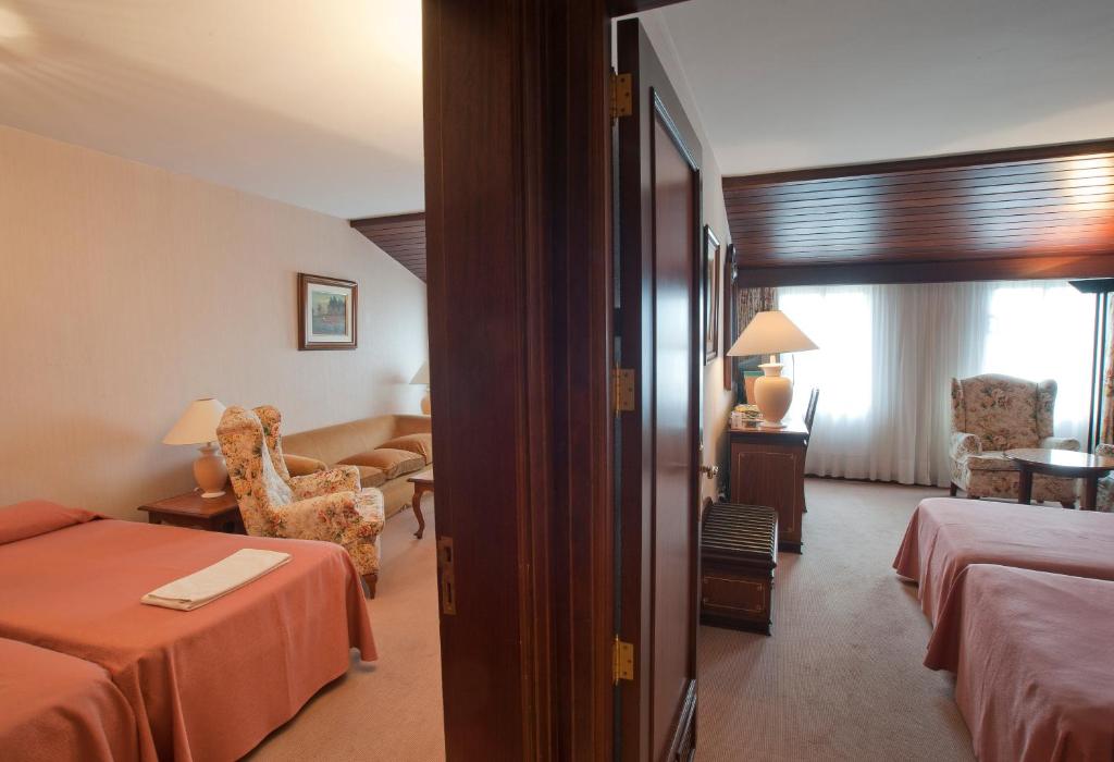 Postel nebo postele na pokoji v ubytování Hotel Riu Fluviá