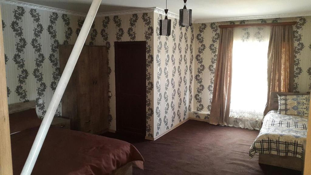 Postel nebo postele na pokoji v ubytování Lake Tabatskuri