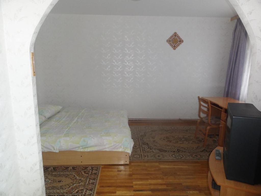 Postel nebo postele na pokoji v ubytování Hotel Rebir