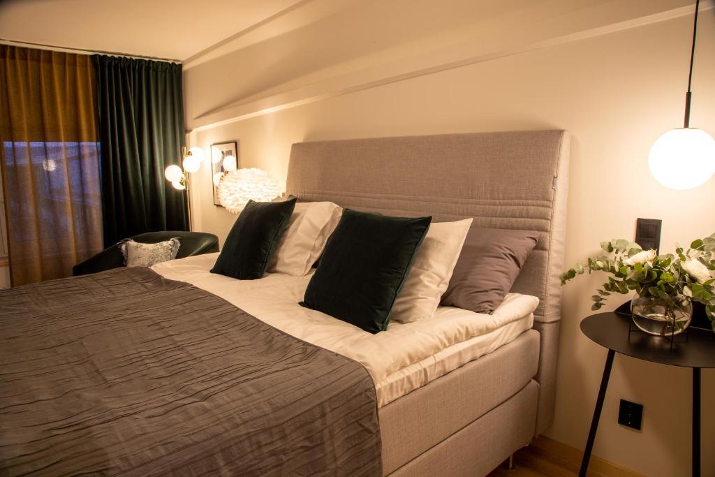 Postel nebo postele na pokoji v ubytování Hotell Syfabriken