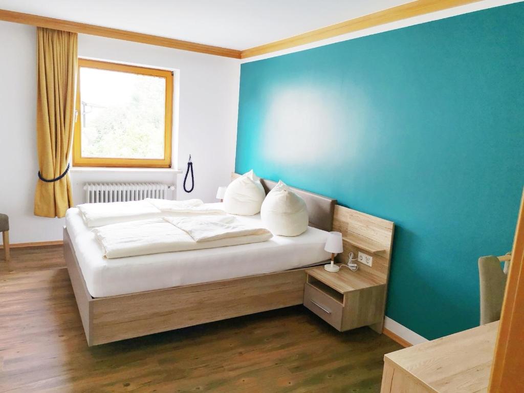 Postel nebo postele na pokoji v ubytování Hotel Oyer Hof - selbst Service