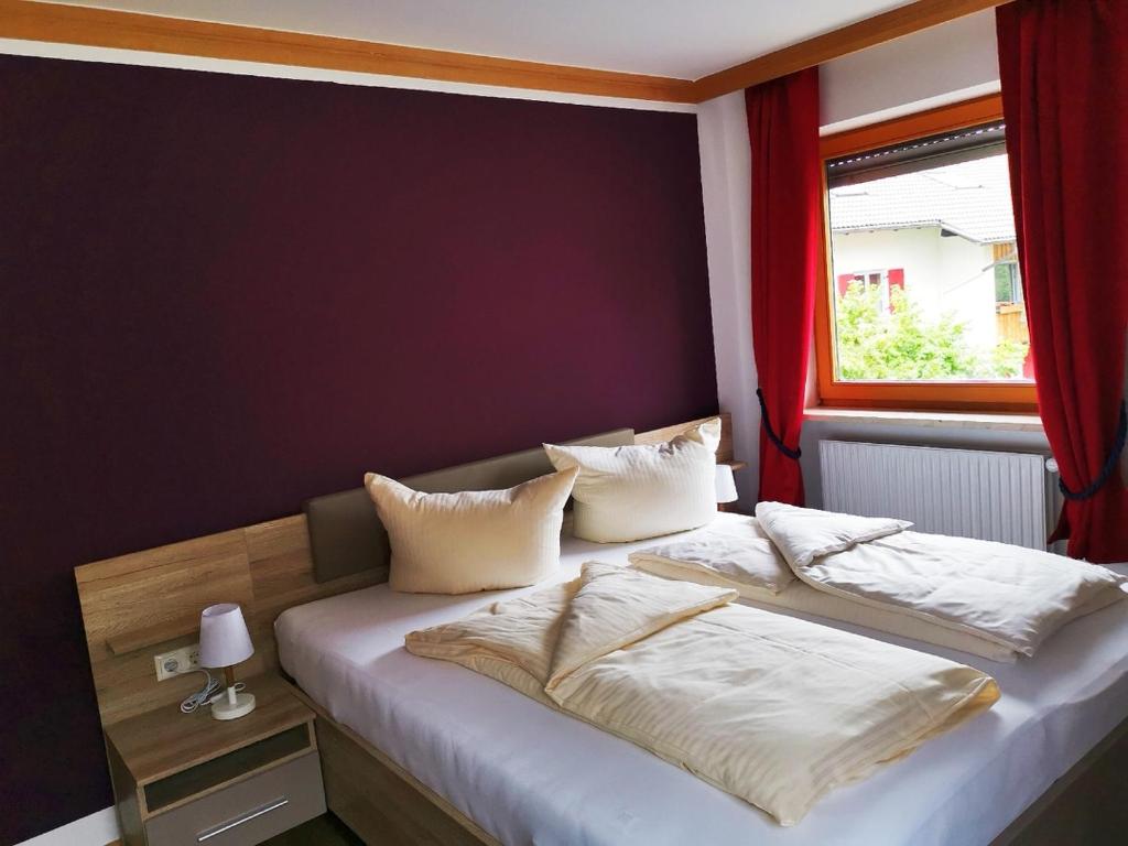 Postel nebo postele na pokoji v ubytování Hotel Oyer Hof - selbst Service
