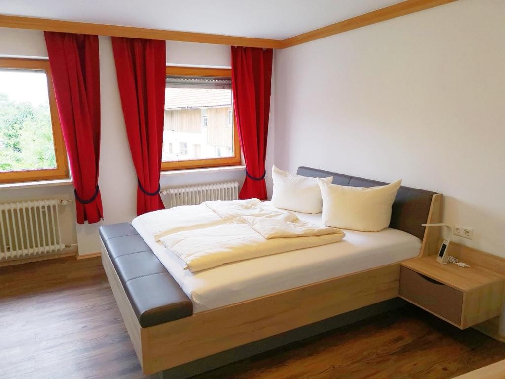 Postel nebo postele na pokoji v ubytování Hotel Oyer Hof - selbst Service