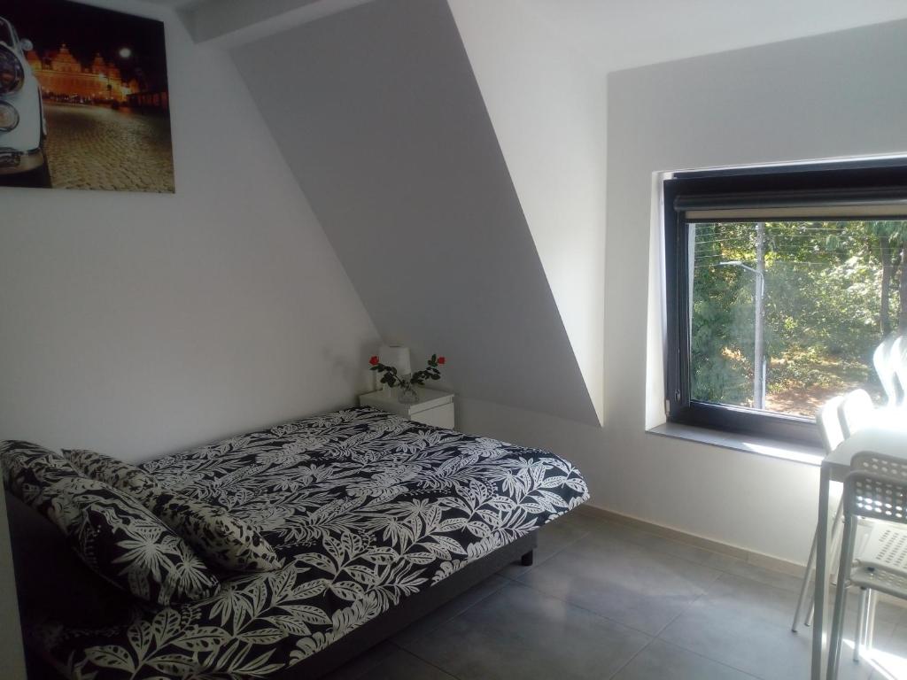 Posteľ alebo postele v izbe v ubytovaní Villa Centrum
