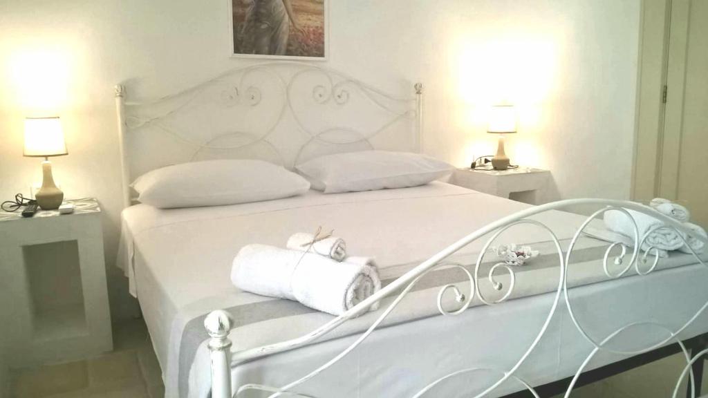 Кровать или кровати в номере A CASA NOSCIA - BB SAN PIETRO IN BEVAGNA Charming house