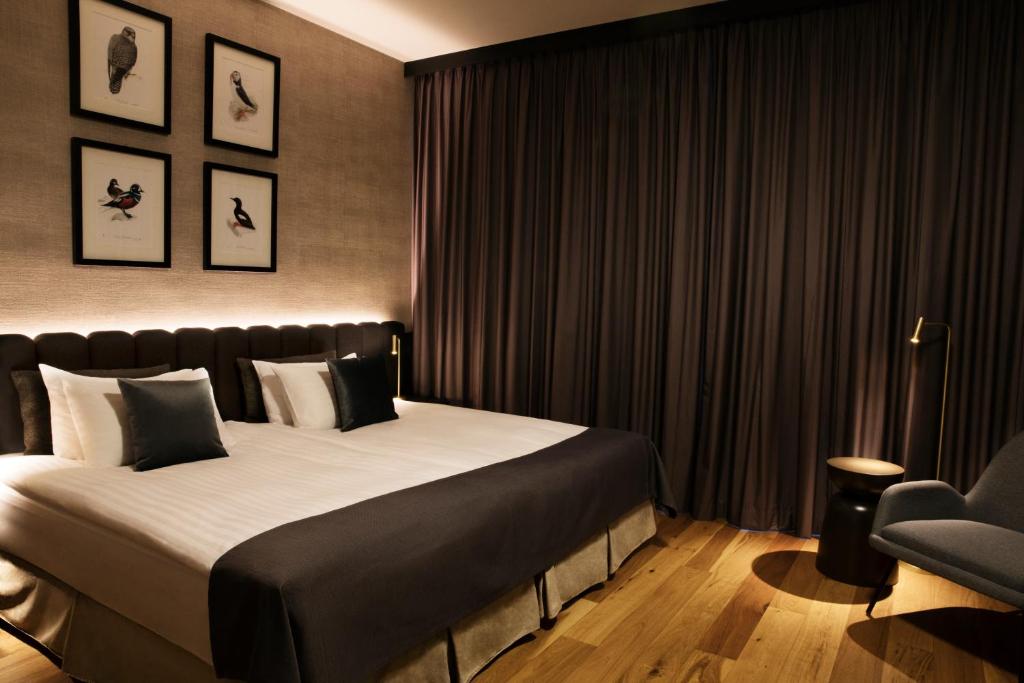 Postel nebo postele na pokoji v ubytování Hotel Reykjavík Grand