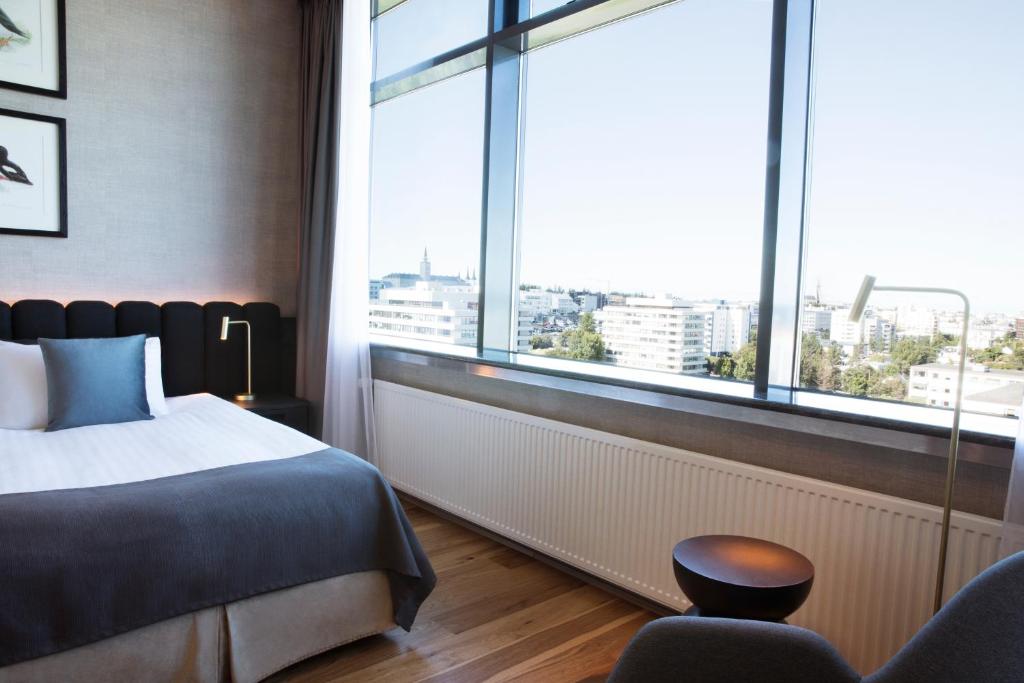 Postel nebo postele na pokoji v ubytování Hotel Reykjavík Grand