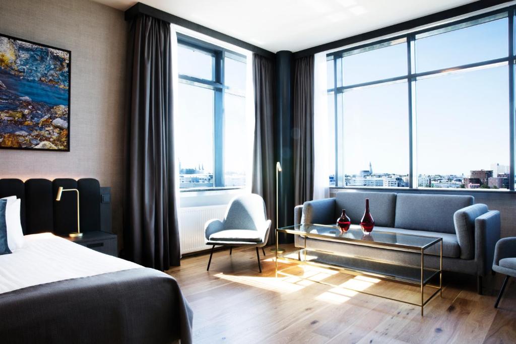 Postel nebo postele na pokoji v ubytování Hotel Reykjavík Grand