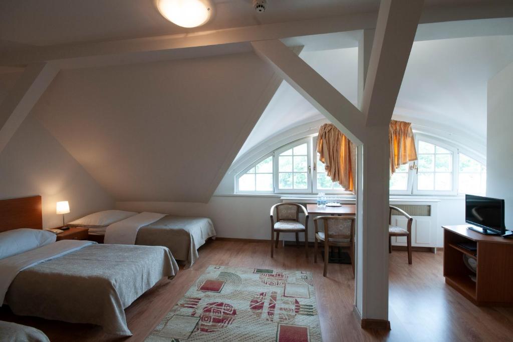 Posteľ alebo postele v izbe v ubytovaní Art Deco Hotel Hoffmann