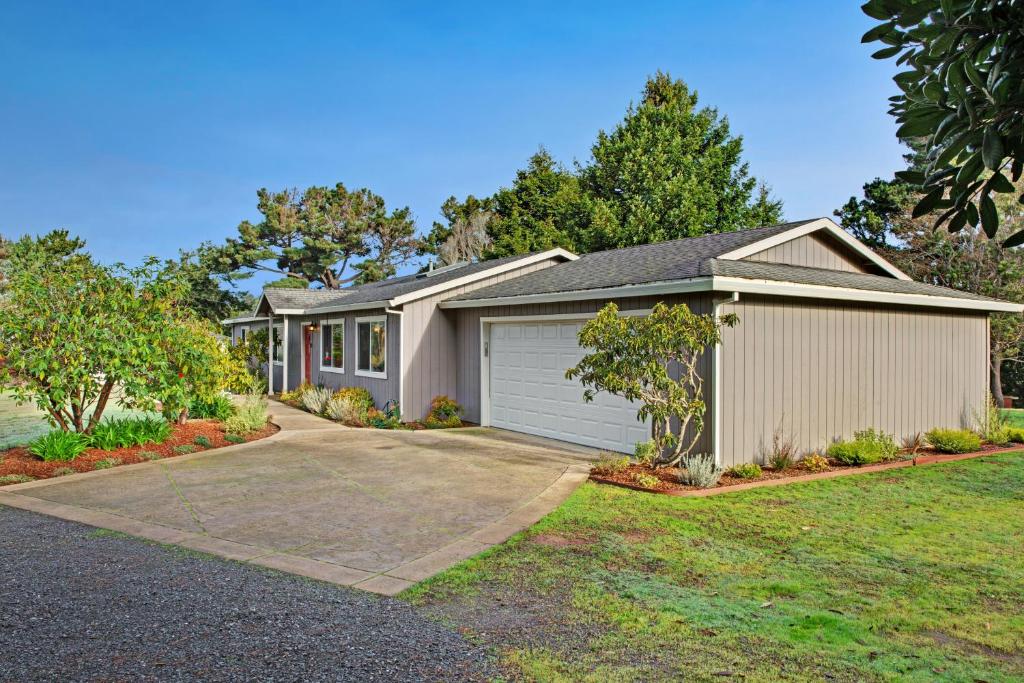 a house with a garage and a driveway at Park View in Fort Bragg