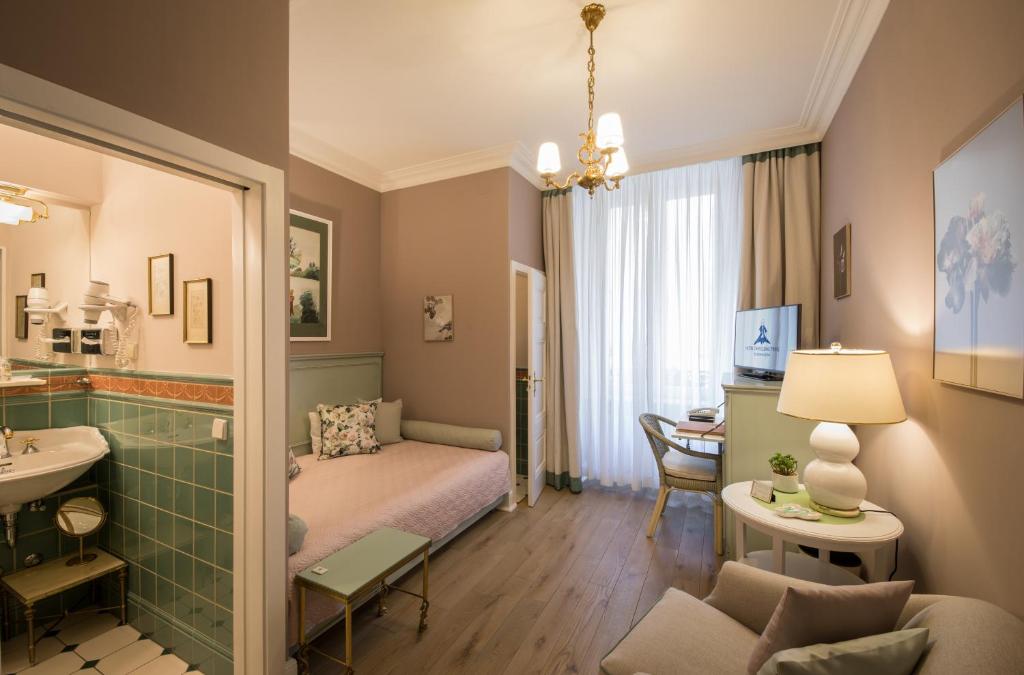 Postel nebo postele na pokoji v ubytování Hotel Der Kleine Prinz