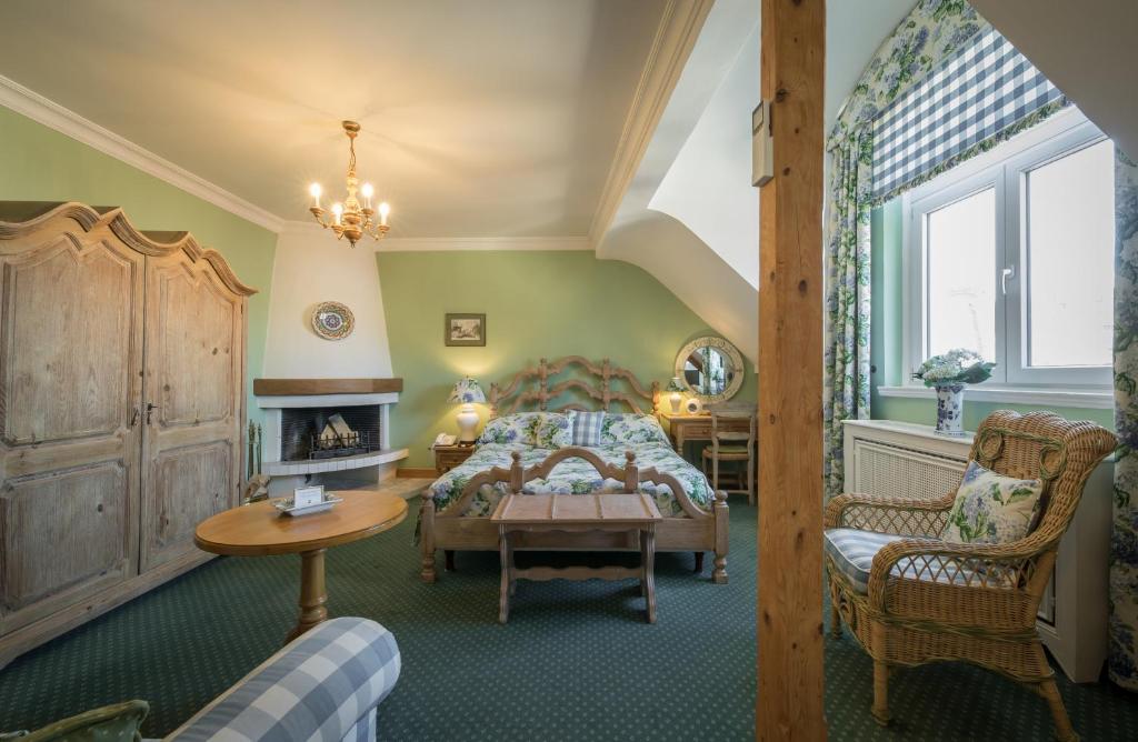 TV a/nebo společenská místnost v ubytování Hotel Der Kleine Prinz