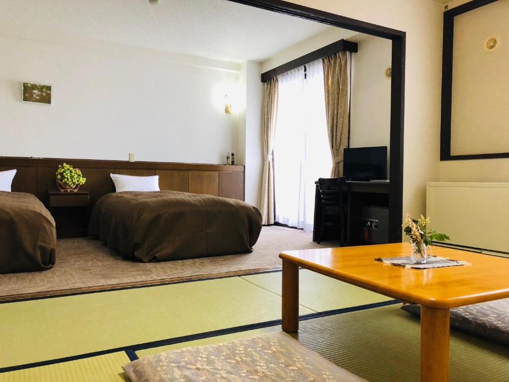 Posezení v ubytování Hotel Belle-Cour Inomata