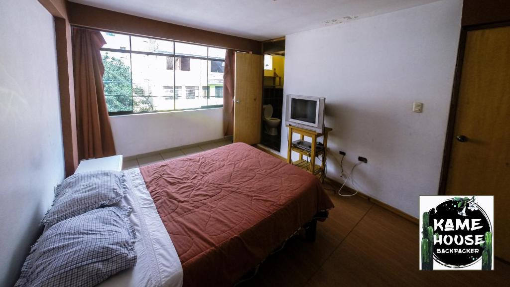 Postel nebo postele na pokoji v ubytování Kame House hostel