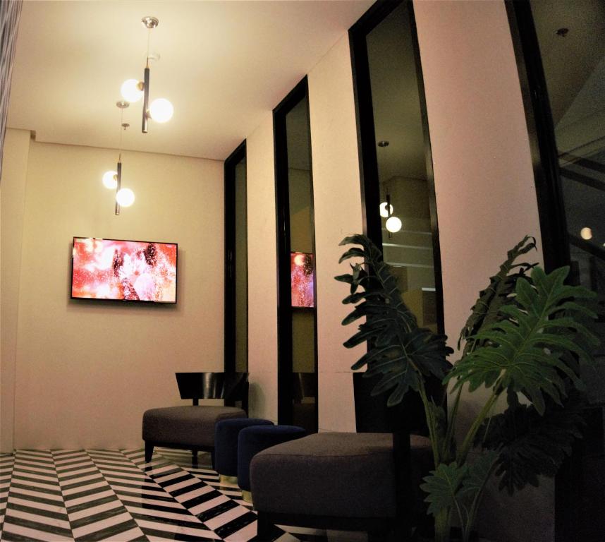 TV a/nebo společenská místnost v ubytování CREVICE HOTEL