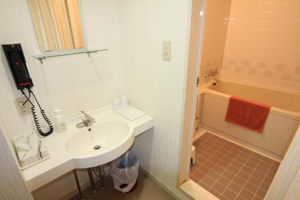 Koupelna v ubytování Hotel Belle-Cour Inomata