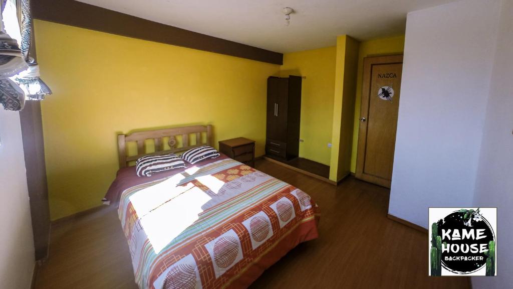 Postel nebo postele na pokoji v ubytování Kame House hostel