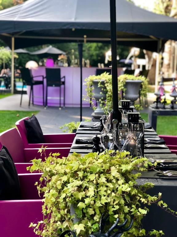 Zahrada ubytování Charmehotel Manoir Ogygia