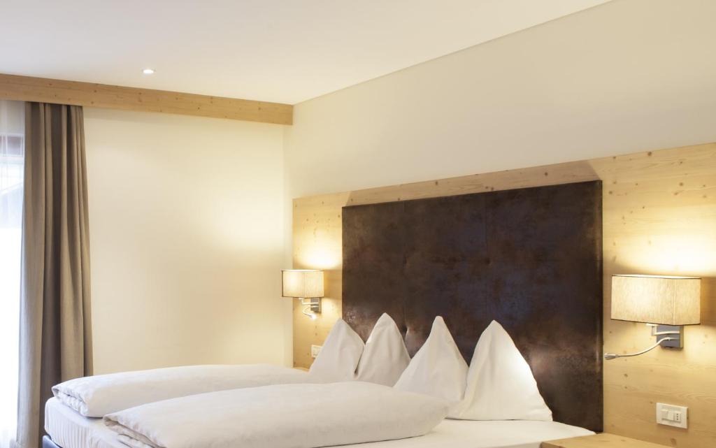 Postel nebo postele na pokoji v ubytování Hotel Stefanshof