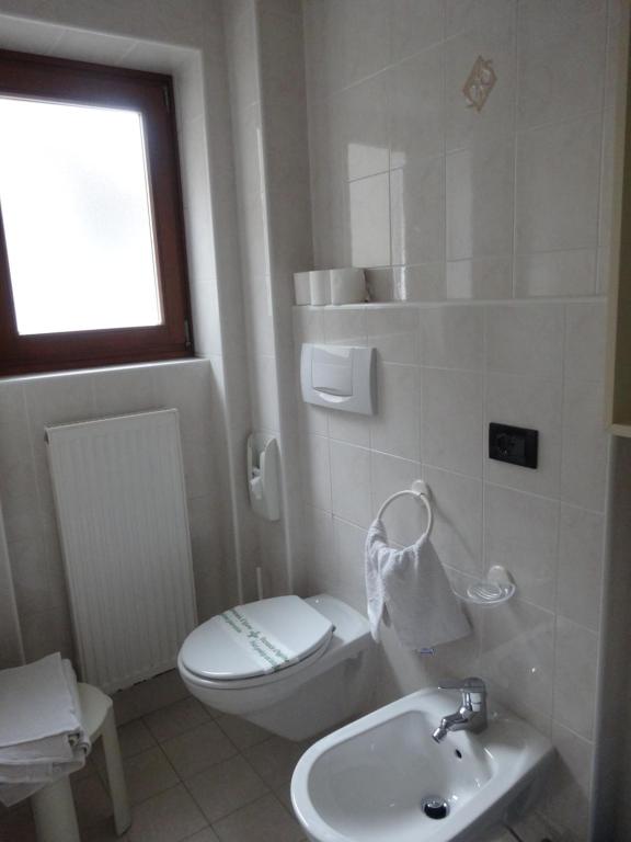 Koupelna v ubytování Hotel Genzianella