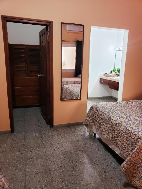 Postel nebo postele na pokoji v ubytování Portal los Castaños
