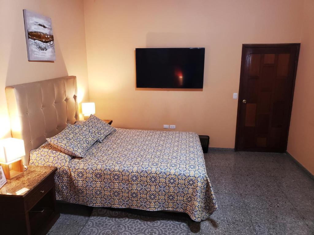 Postel nebo postele na pokoji v ubytování Portal los Castaños