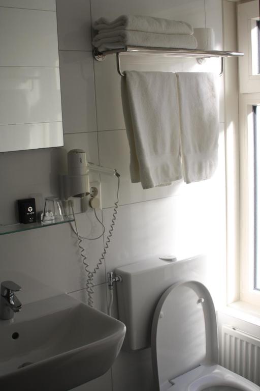 Koupelna v ubytování Hotel Zee en Duin