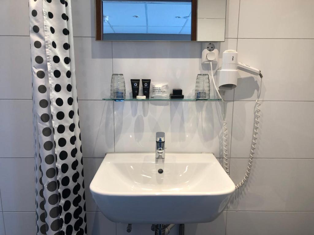 Koupelna v ubytování Hotel Zee en Duin