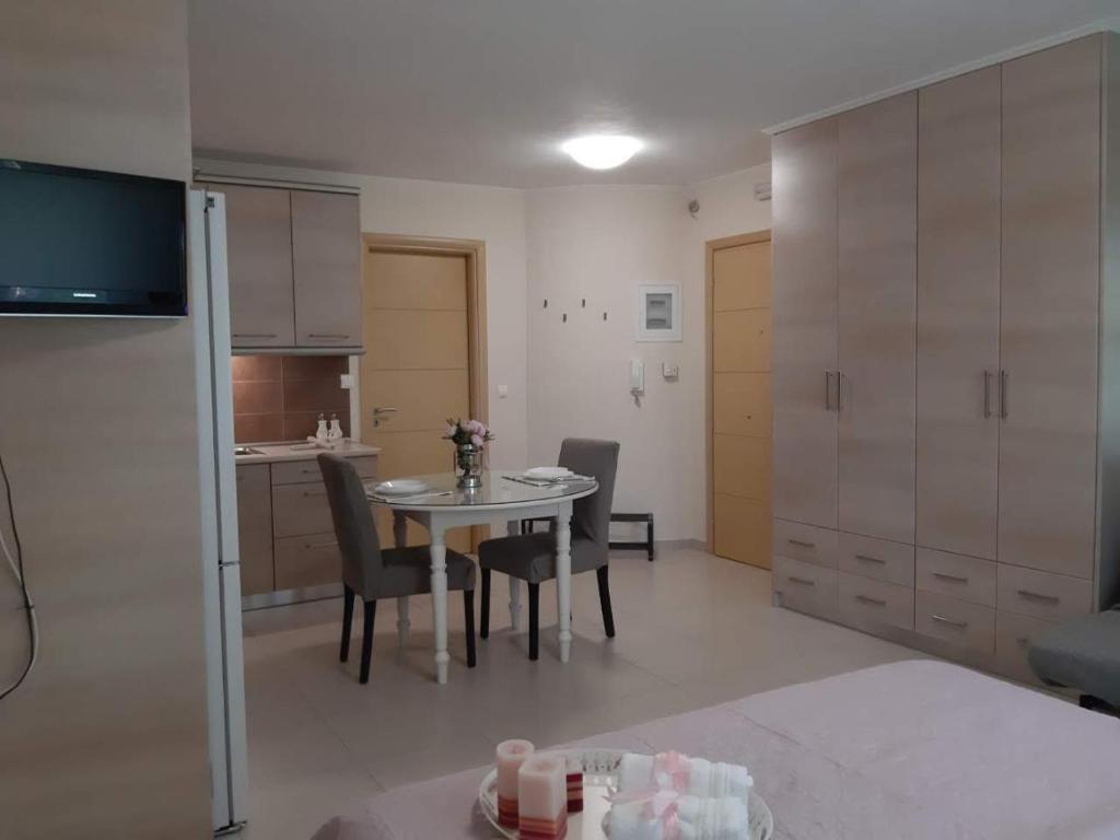 TV a/nebo společenská místnost v ubytování Perfect Location το τέλειο μέρος για τις αποδράσεις σας!!!